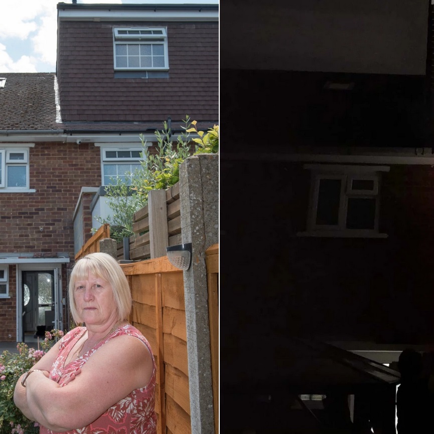 A homeowner is at war with her neighbour over their loft conversion